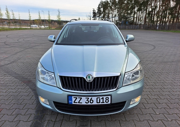 Skoda Octavia cena 24800 przebieg: 153000, rok produkcji 2009 z Pabianice małe 352